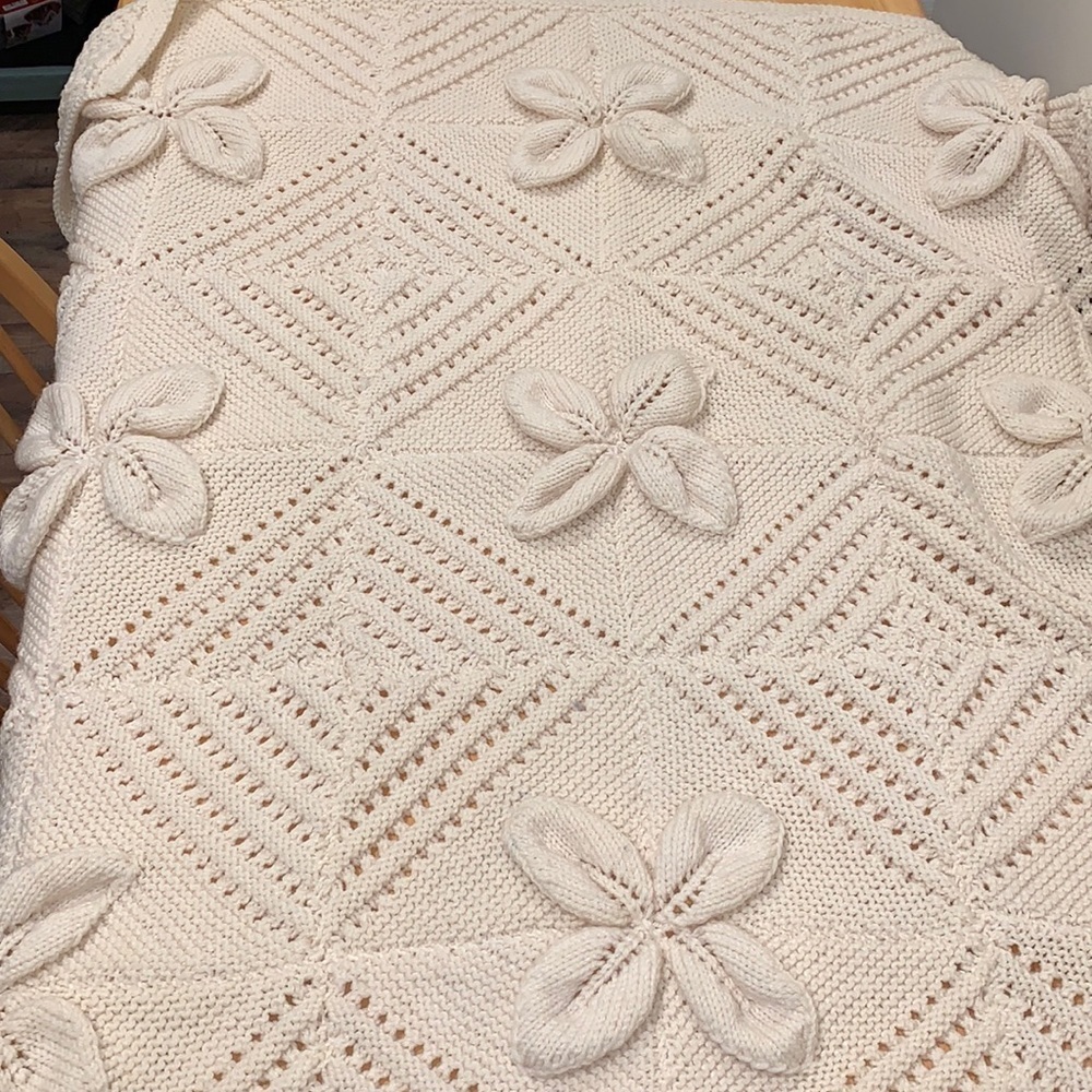 Hand crocheted throw.  Off white.  Approximate size 43’x43’